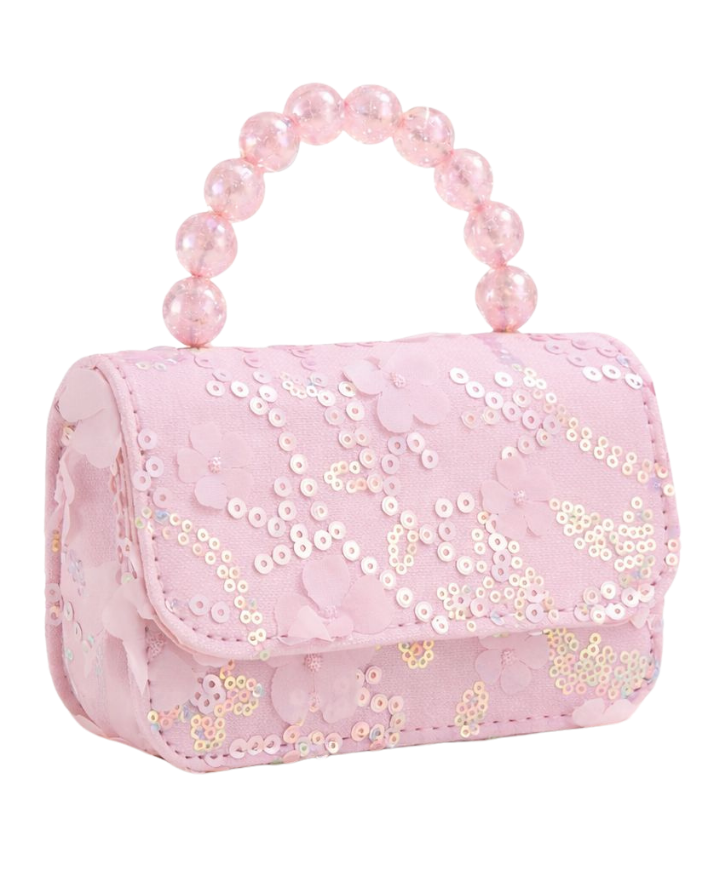 Pink bag with pearls handle